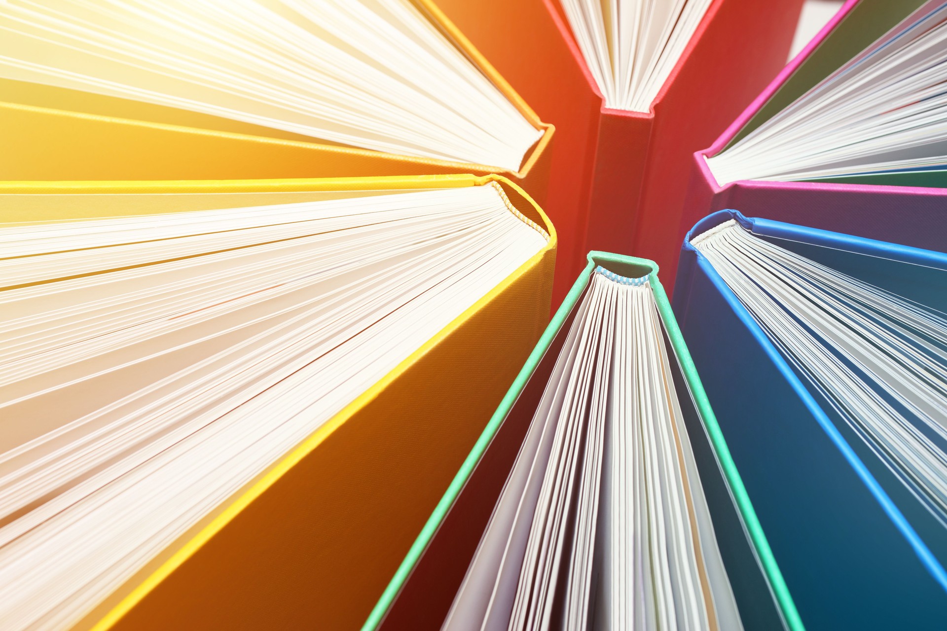 Fanned Out Colorful Books Forming Abstract Circle Pattern - Explosion of Knowledge